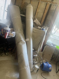 a room with a bunch of pipes and a vacuum