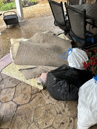 a chair is sitting on a patio