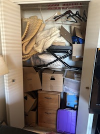a closet with a lot of items in it